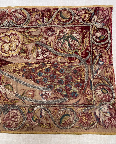 Early Silk and Metal Thread Embroidered Velvet Panel with Peacock and Flowers: C17th Italy or Spain