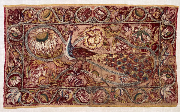 Early Silk and Metal Thread Embroidered Velvet Panel with Peacock and Flowers: C17th Italy or Spain