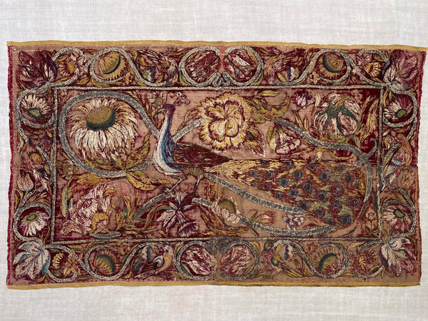 Early Silk and Metal Thread Embroidered Velvet Panel with Peacock and Flowers: C17th Italy or Spain